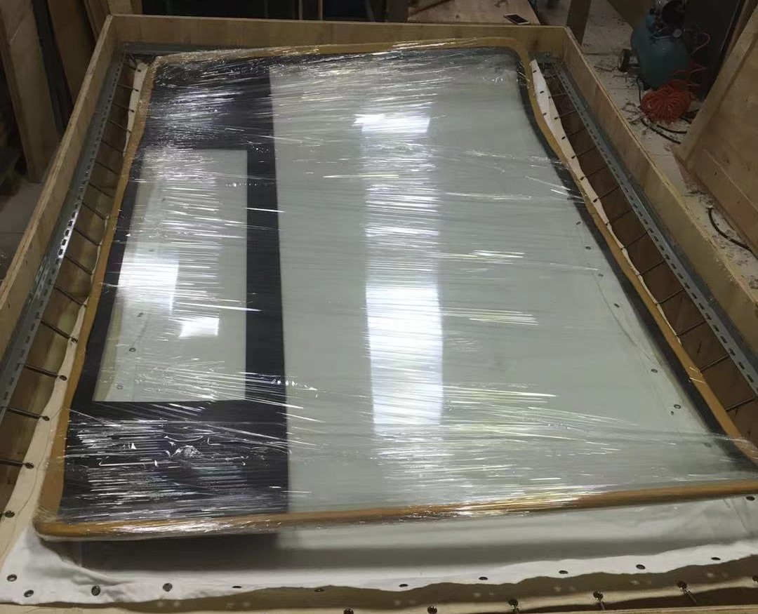 大型鋼化玻璃出口到尼泊爾,彈簧蹦床包裝方案——一次危險品進(jìn)出口包裝方案的飛躍！